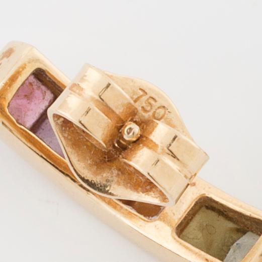 A multicolored gemstone pendant and a pair of earrings, "Collection Rainbow” by H. Stern.