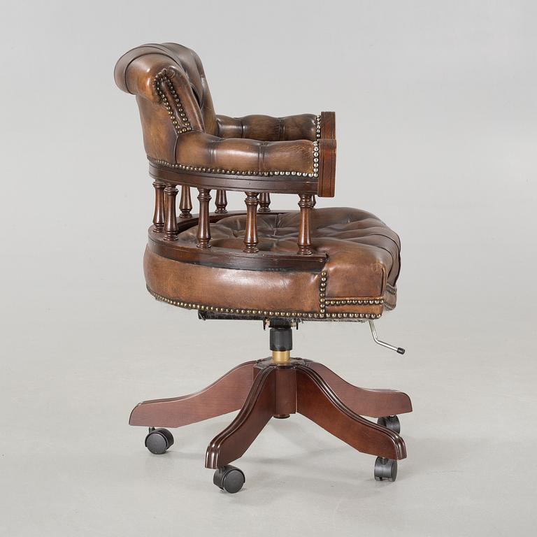 A desk chair in English style, made in the second half of the 20th century.