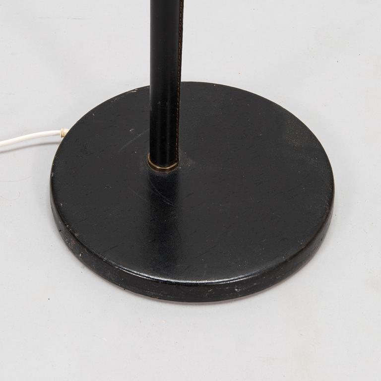 Alvar Aalto, an 'Angel's Wing' floor lamp. Manufactured by Valaistustyö.