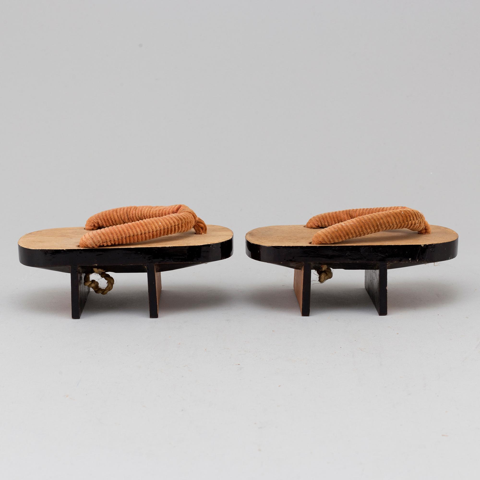 A pair of Japanese 'Geta' shows and two Chinese pouches, early 20th century.