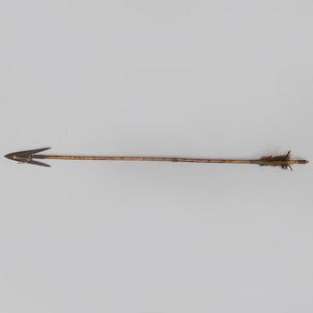 A 19th/20th century south-east asian bow with an arrow.