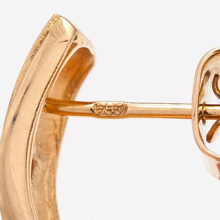 A pair of 14K ogld earrings with diaomnds ca. 0.036 ct in total. Finland 1992.
