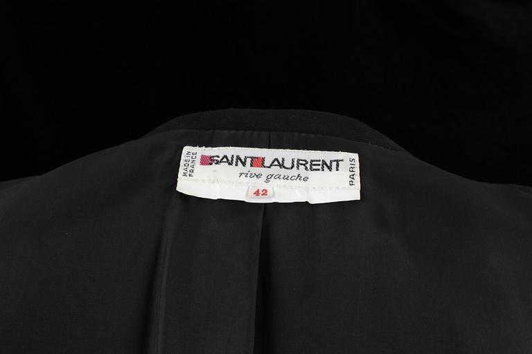 A black evening jacket by Yves Saint Laurent.
