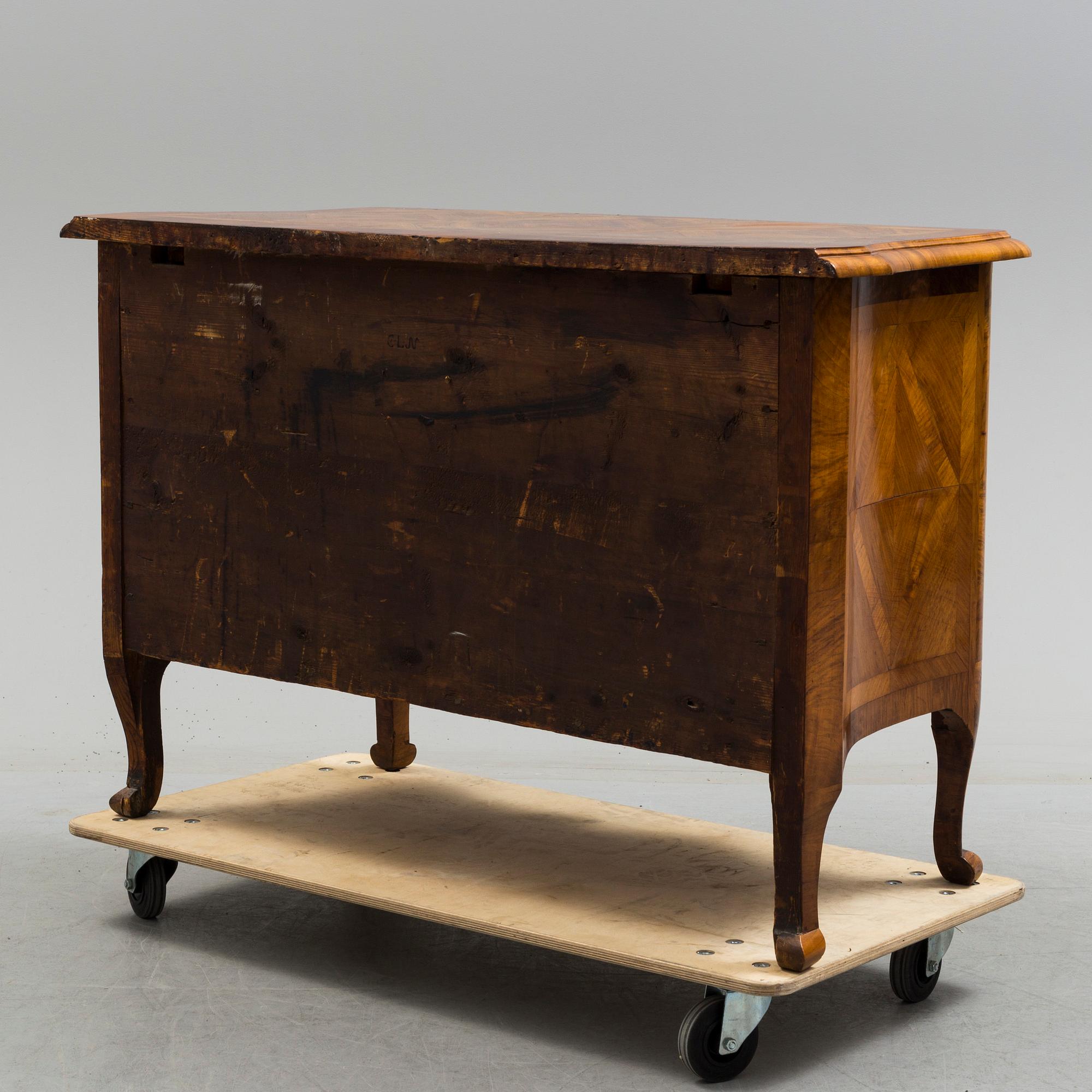 A late baroque mid 18th century chest of drawers by Christian Linning.