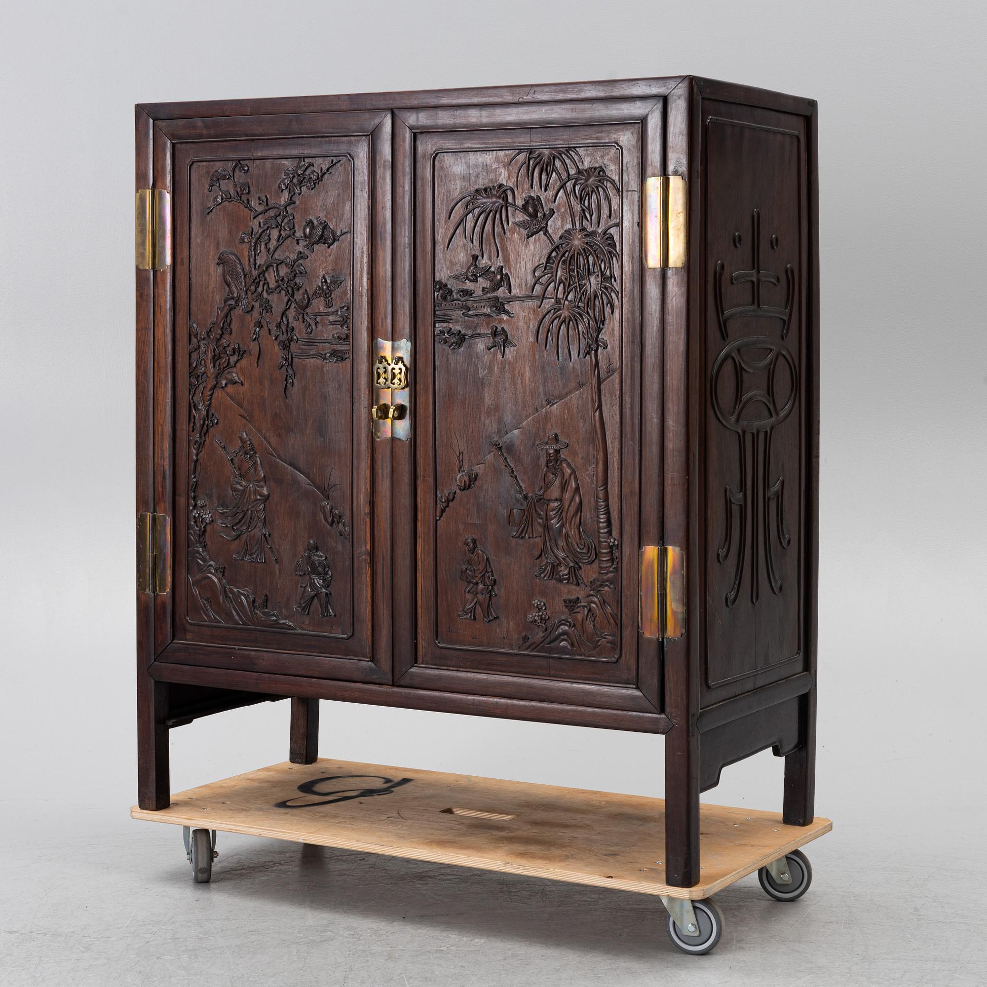 A hardwood cabinet, China, 20th century.