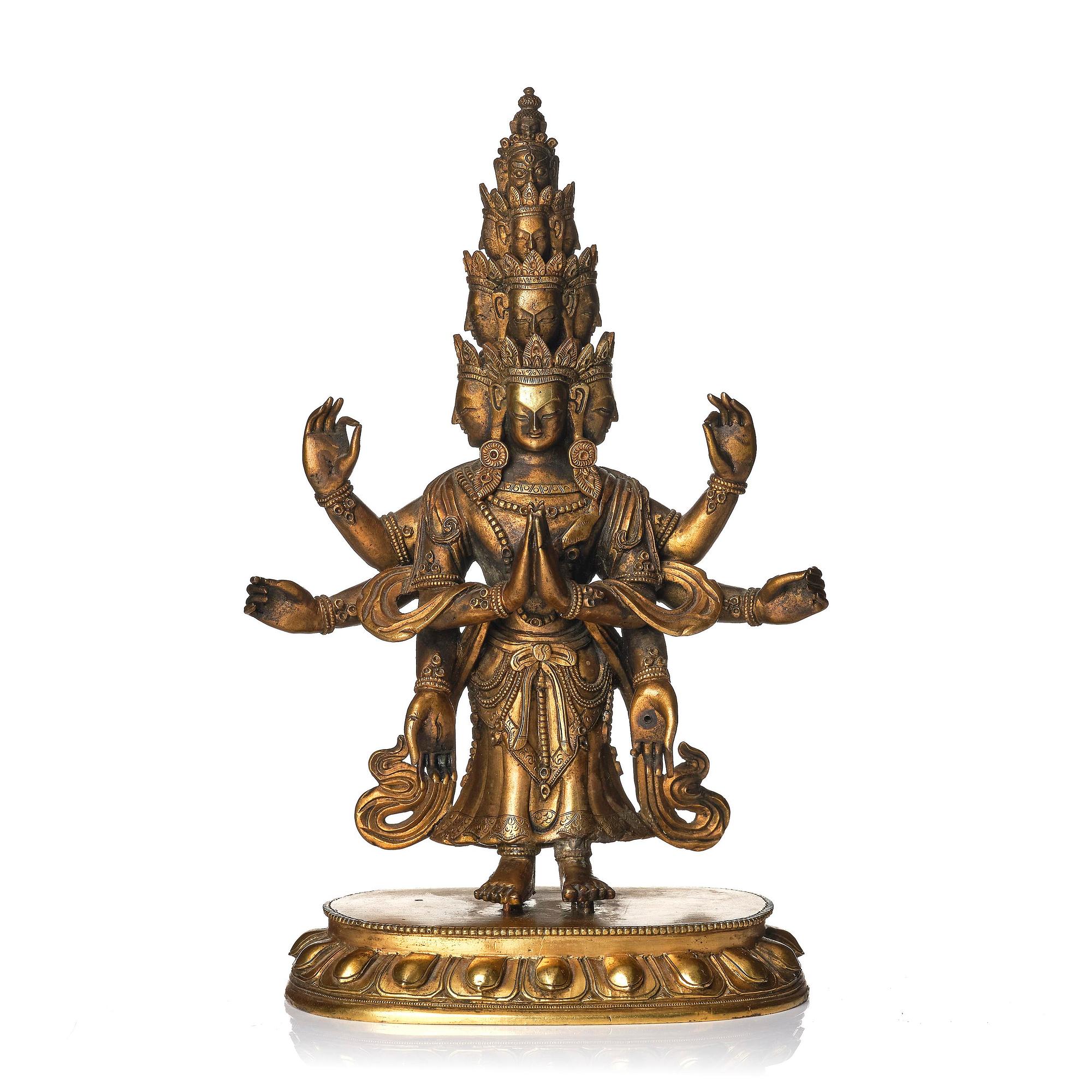 A Tibeto-Chinese gilt bronze figure of Avalokiteshvara Ekasdashamukra, 19th century.