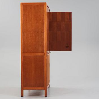 David Rosén, a mahogany and teak cabinet, for Stockholm's Association of Crafts, signed and dated 1959.