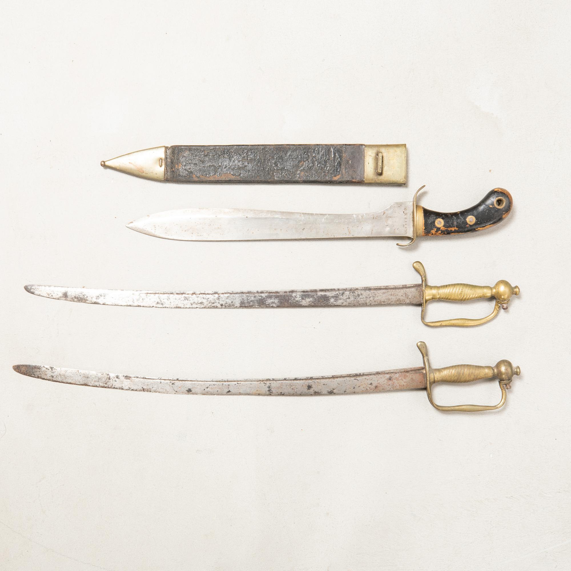 Three Swedish cutlasse 1856 and 1848 pattern.