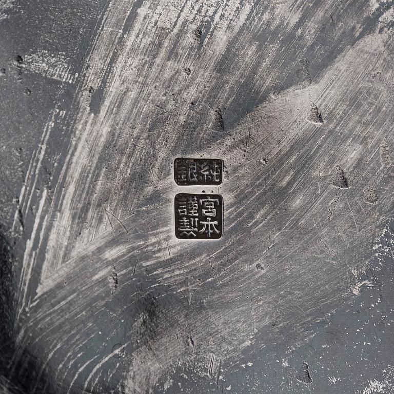 A silver cocktail shaker with strainer, Japan, first half of the 20th century.