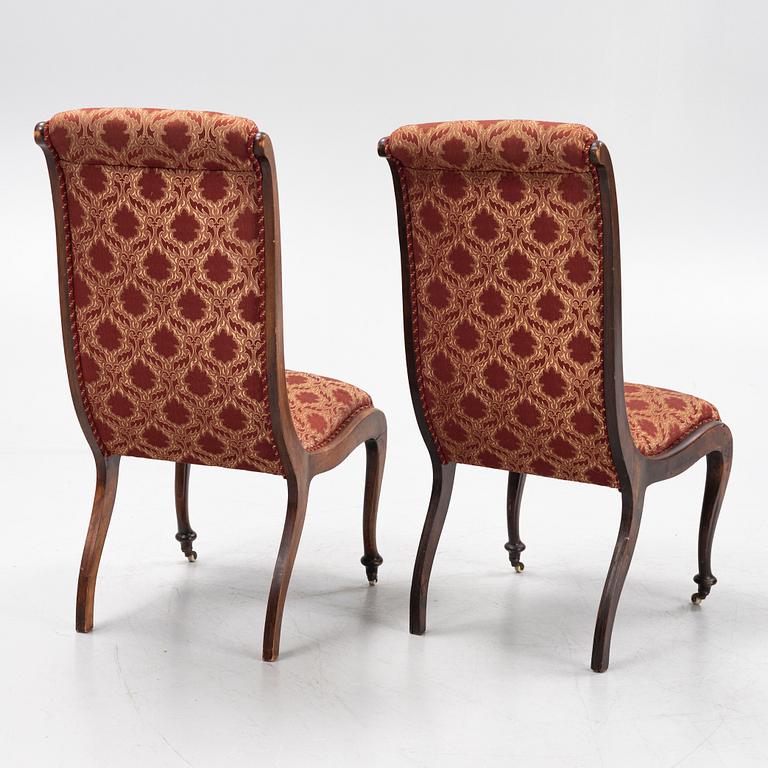 A pair av easy chairs, 19th Century.