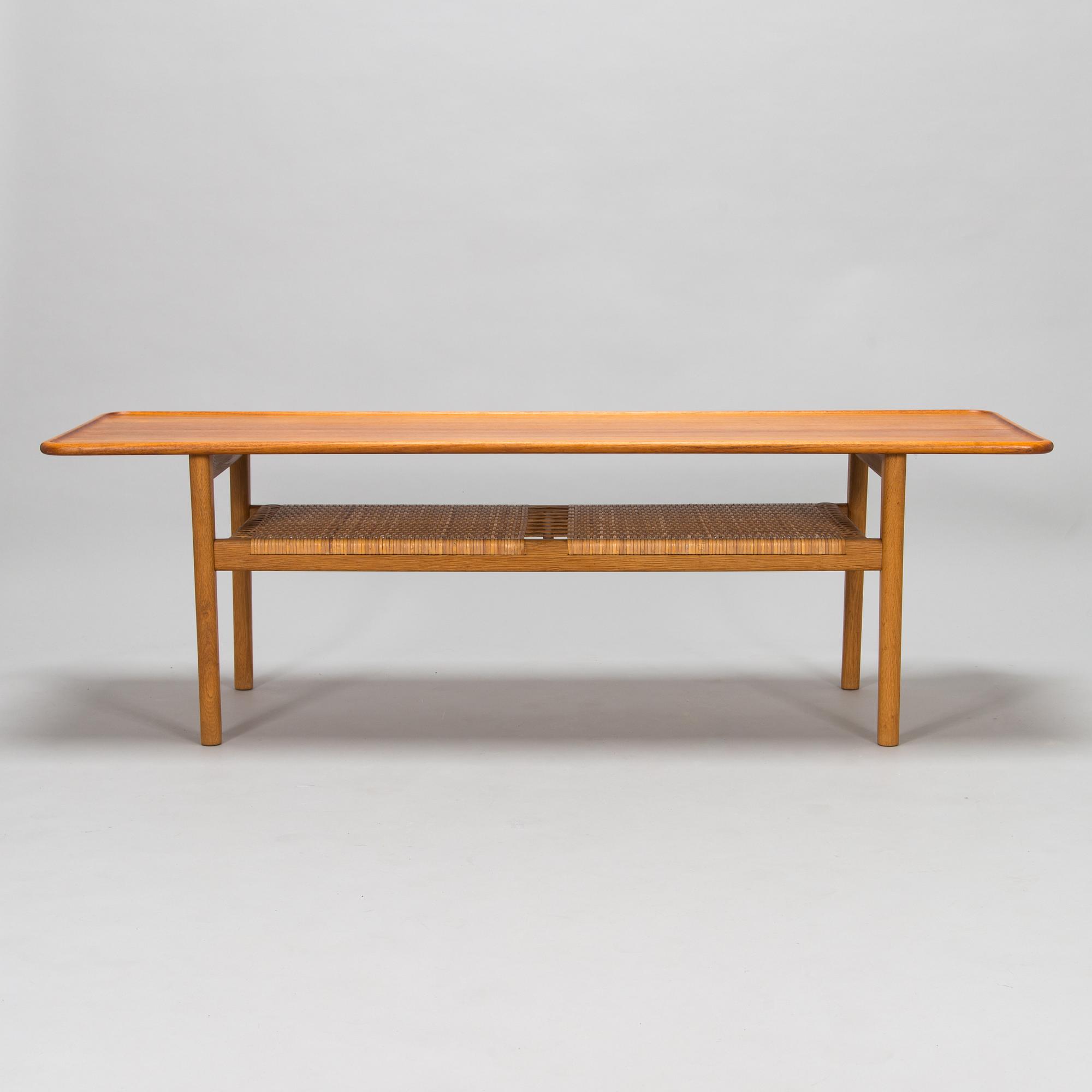 An oak and tek coffee table by Hans J Wegner for Andreas Tuck, 1960s.