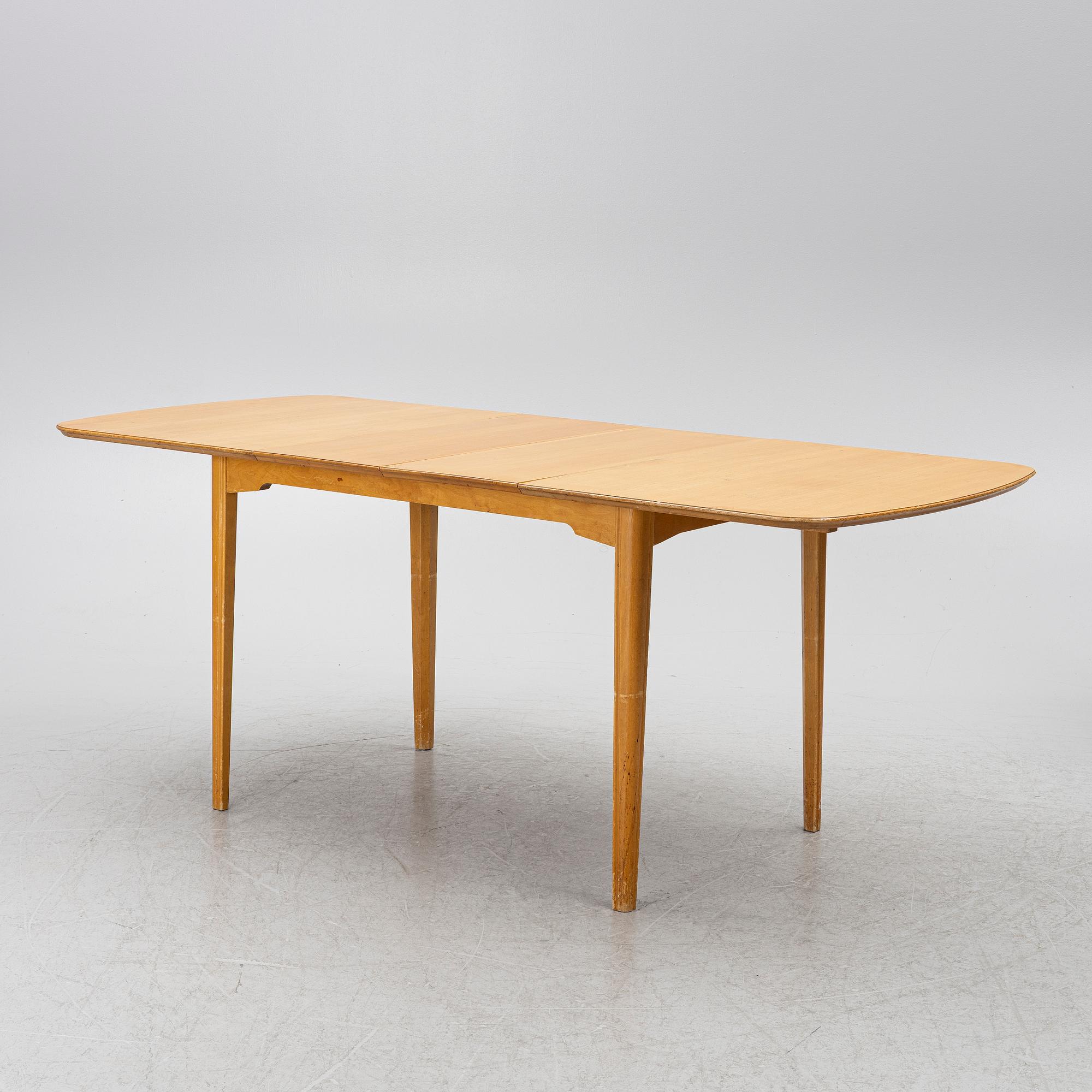 A dining table with six chairs, Sweden, 1940's.