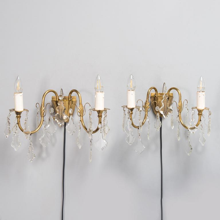 Mauri Almari, a pair of mid-20th-century brass wall sconces for Idman.