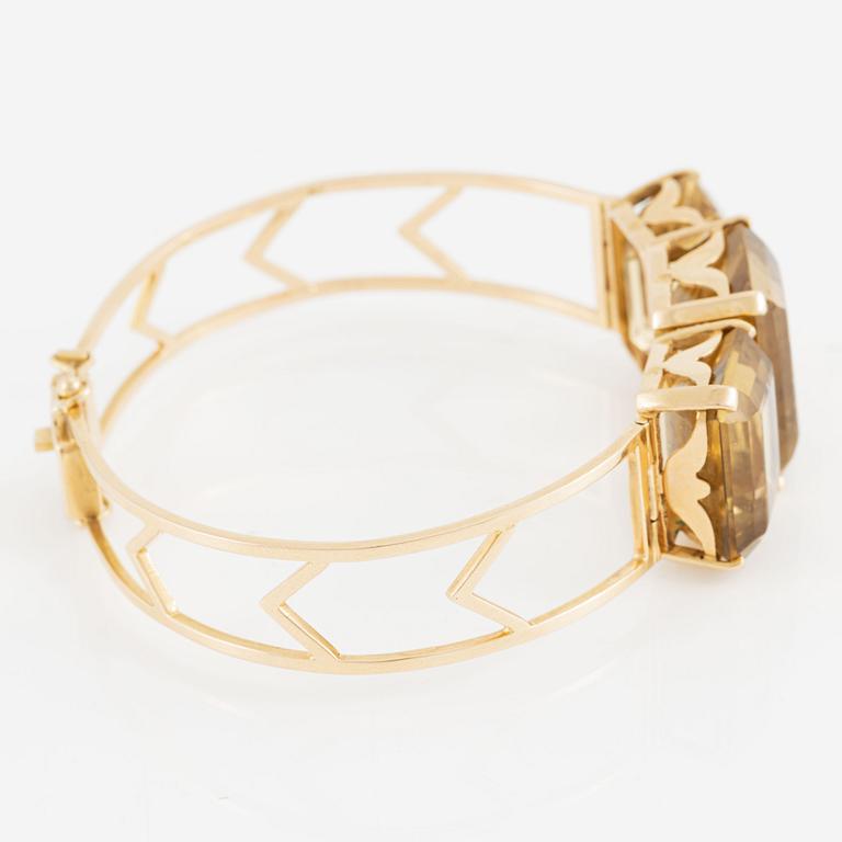 Armband 18K guld med fasettslipad kvarts.