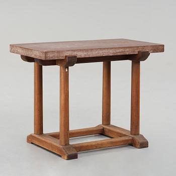 Axel Einar Hjorth, a red limestone top and stained pine side table, Nordiska Kompaniet, Sweden 1929.