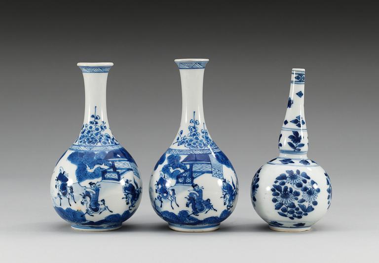 A pair of blue and white vases and a water sprinkler, Qing dynasty, Kangxi (1662-1722).