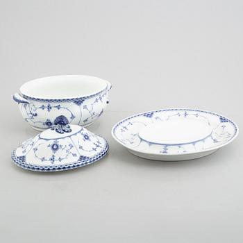 A porcelain 'Blue fluted half lace' / 'Musselmalet' tureen with cover and stand, Royal Copenhagen, 19th century.