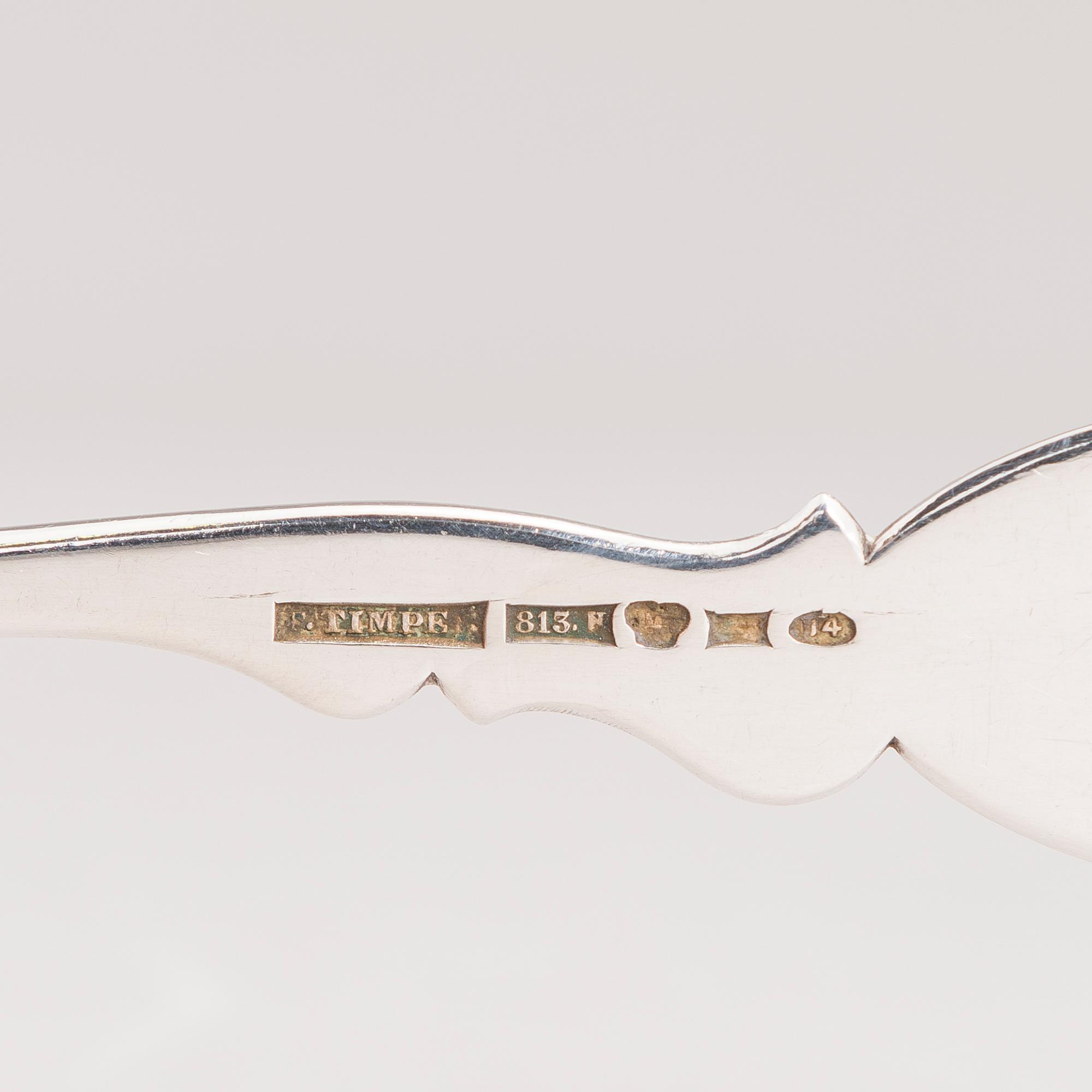 Silver serving cutlery, three with mark of Ferdinand Timper, Helsinki 1901-02 and a pair with German marks, ca. 1900.