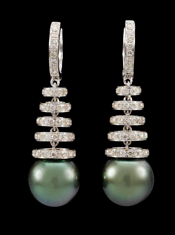 A pair of gold, diamond and cultured pearl earrings.