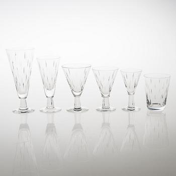 SAARA HOPEA 71-piece Inari crystal stemware set for Nuutajärvi. Designed in 1953.