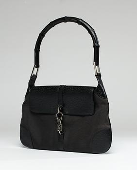 152. A Gucci handbag.