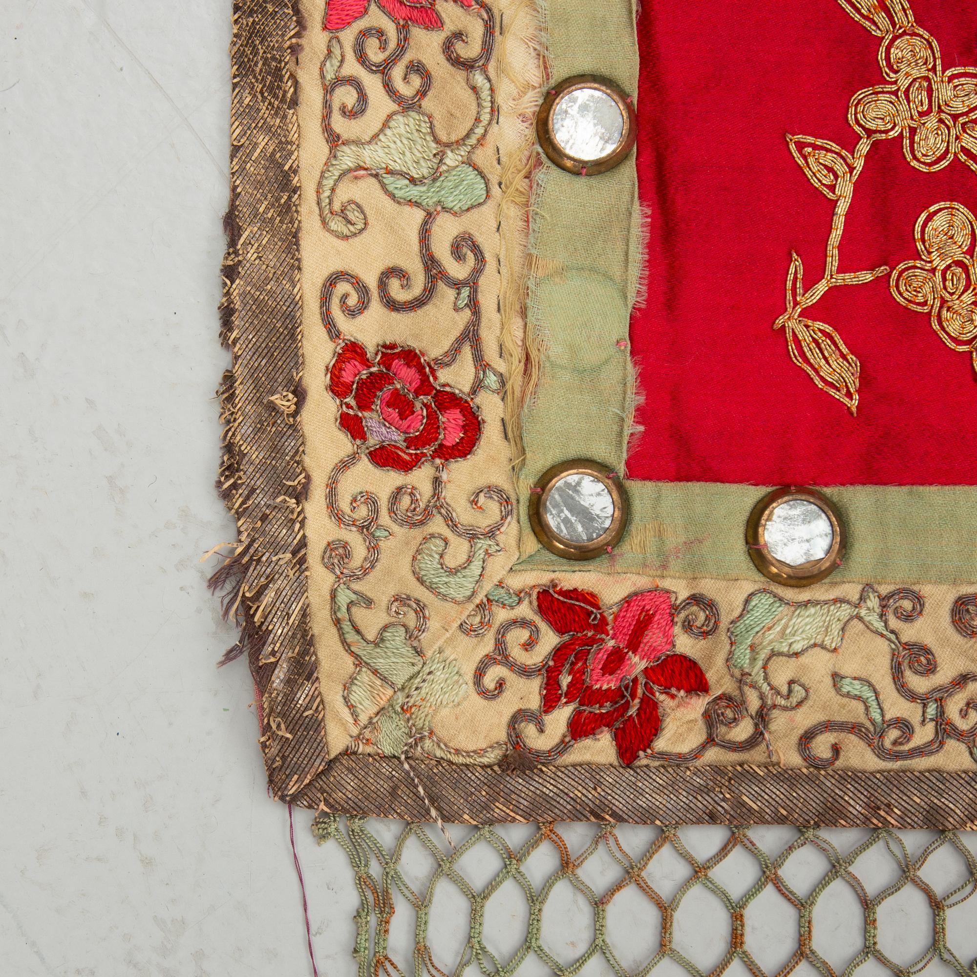 A Chinese silk embroidery, late Qing dynasty (1644–1912).