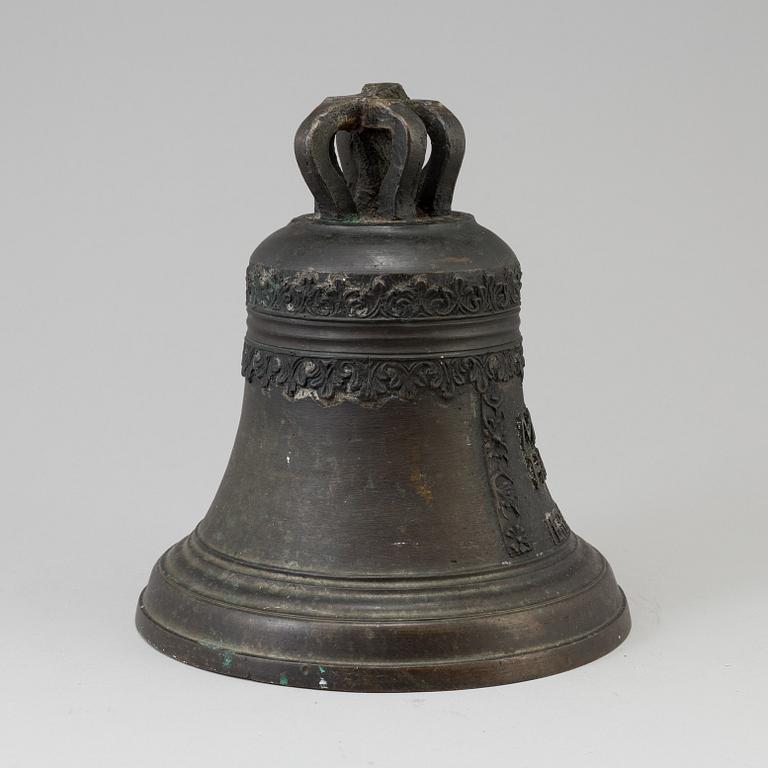 A BRONZE AND IRON BELL, dated 1759.