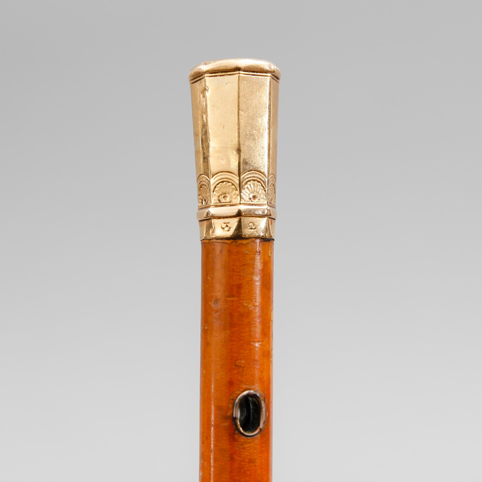 KÄPP, spanskrör, knopp av 18K guld, 1800-tal.