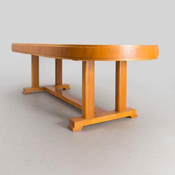 A mid 20th century dining table.