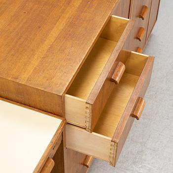 A mahogany, walnut and rosewood veneer set of cabinets with desk, Jönköping Möbelfabriks Aktiebolag. 1950's.