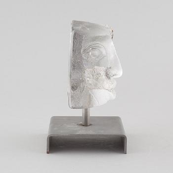 a glass object, signed.