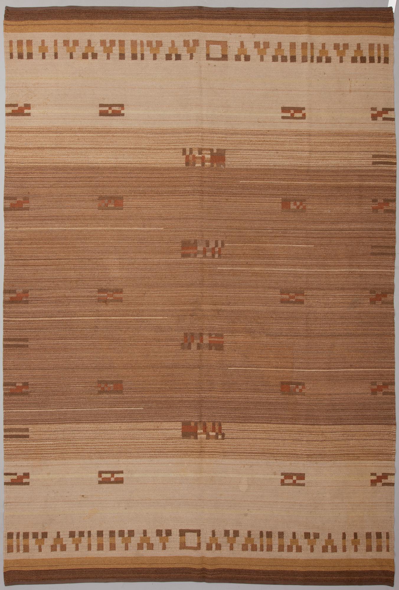 Impi Sotavalta, IMPI SOTAVALTA, A 1930s Finnish flat weave carpet for Kiikan Mattokutomo. Circa 358x244 cm.