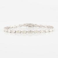 Bracelet 18K white gold with oval and brilliant-cut diamonds.