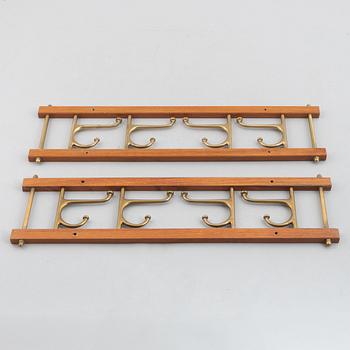 A pair of 'Dekorativ' coat hangers, Skoglunds metallgjuteri, Anderstorp, 1950's/60's.