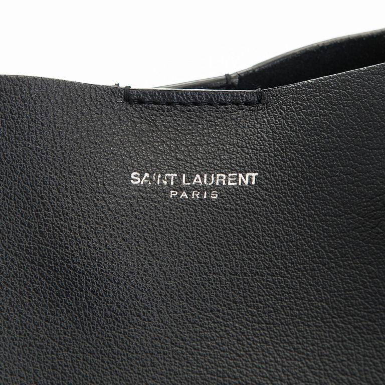 Saint Laurent, a 'Sac shopping' bag.