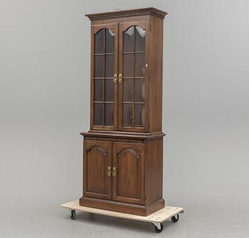 A second half of the 20th century vitrine cabinet marked "Pennsylvania House".