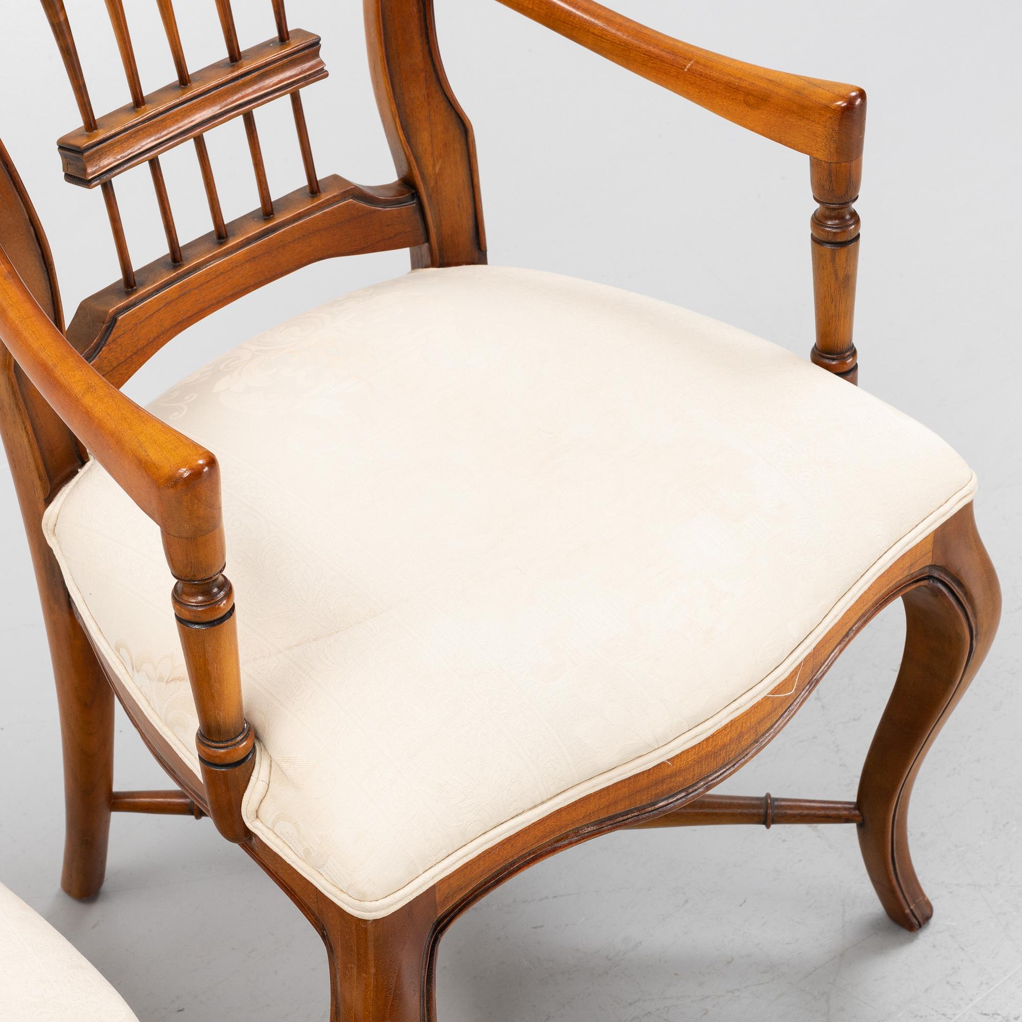 Ten mahogany chairs, Indonesia, late 20th Century.