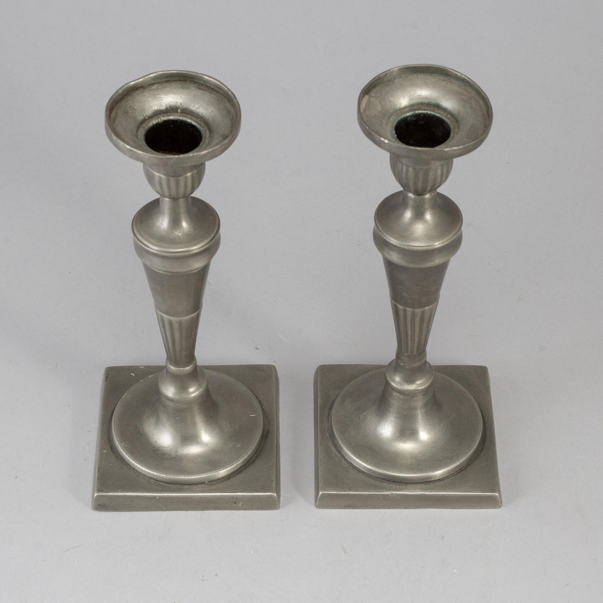 A pair of 18th century pewter candlesticks.