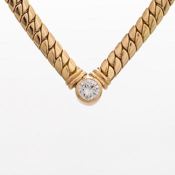 Collier, 18K guld och en briljantslipad diamant.