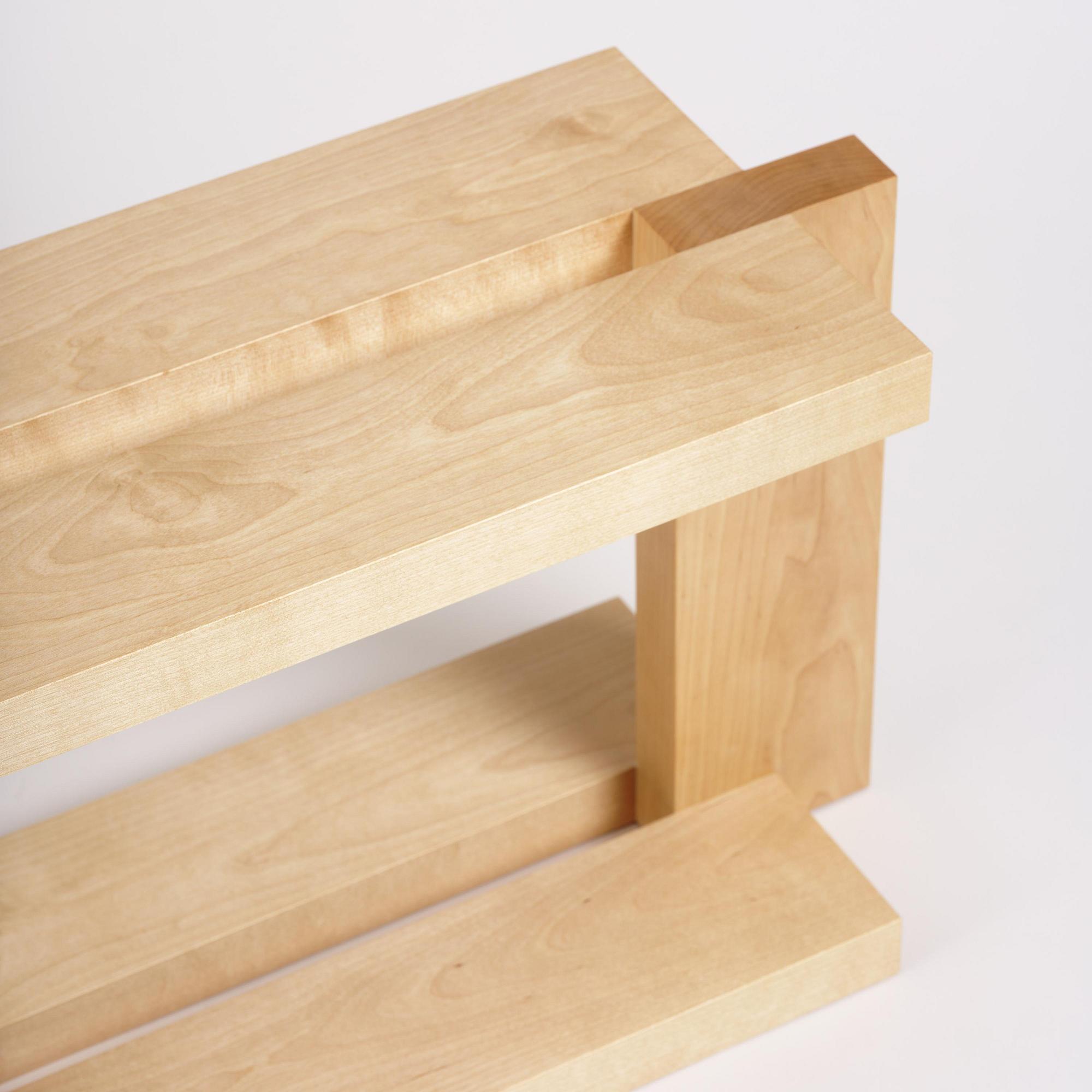 Nick Ross, an "Arrangement #16" coffe table/bench, executed in his studio, Stockholm, 2024.