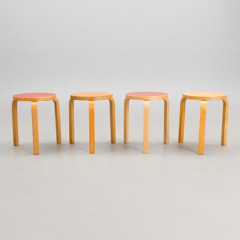 Four stackable stools of model 60 from the 1930-1950s.