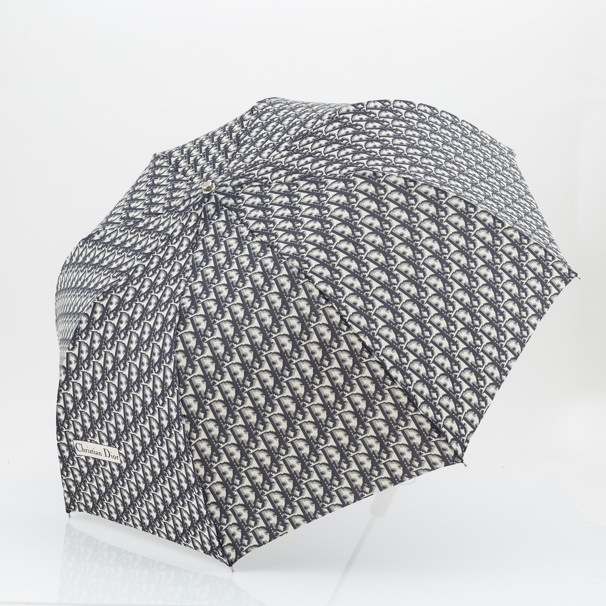 Christian Dior, weekendväska med paraply.