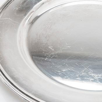 A 12-piece set of silver chargers, makers' marks of Hugo Grün, S.H. Jörgensen..., Denmark, around mid-20th century.