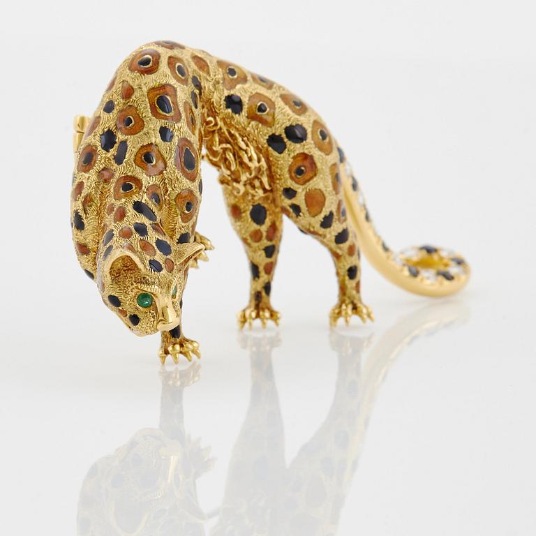 An 18K gold panther brooch set with round brilliant-cut diamonds, sapphires and emeralds.