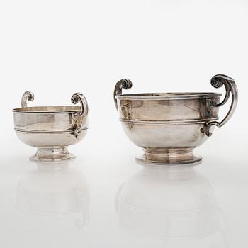 A set of two bowls with handles, sterling silver, England.