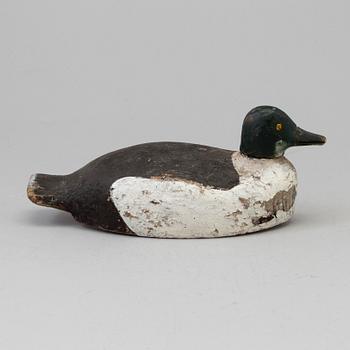 A duck hunt wood decoy circa 1900.