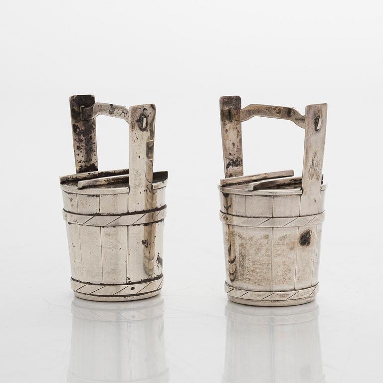 A pair of sterling silver salt- and pepper shakers , Japan, latter half of the 20th century.