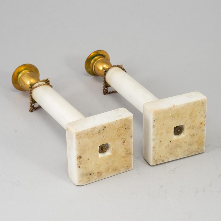 A pair of Gustavians style marble candlesticks, 20th Century.