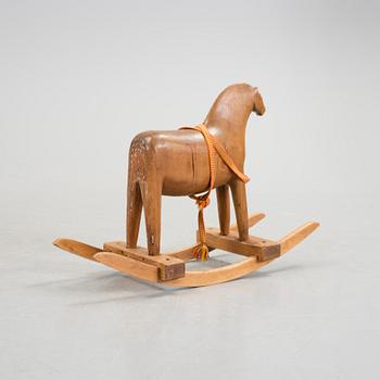 A wooden rocking horse first half of the 20th century.