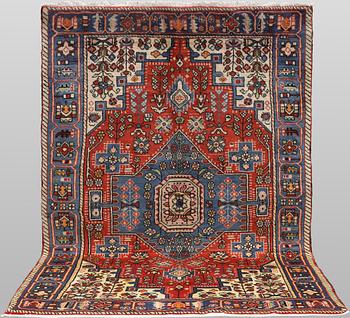 A Hamadan rug, 213 x 138 cm.